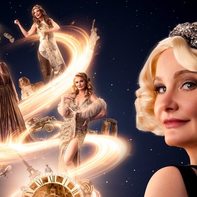 Blonde woman wearing a 1920s jewelled cloche cap with mystical figures to her left.