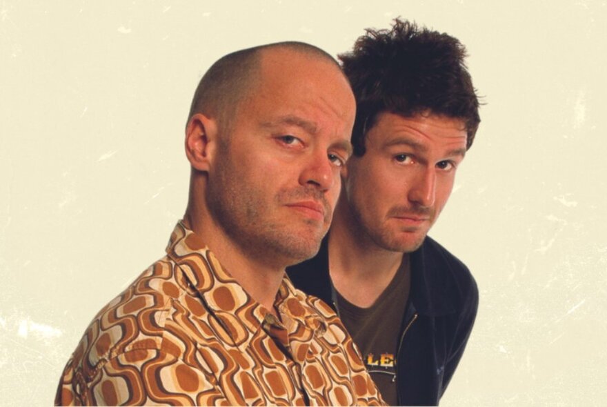 Comedians Wil Anderson and Adam Spencer looking quizzical in the early 2000s.