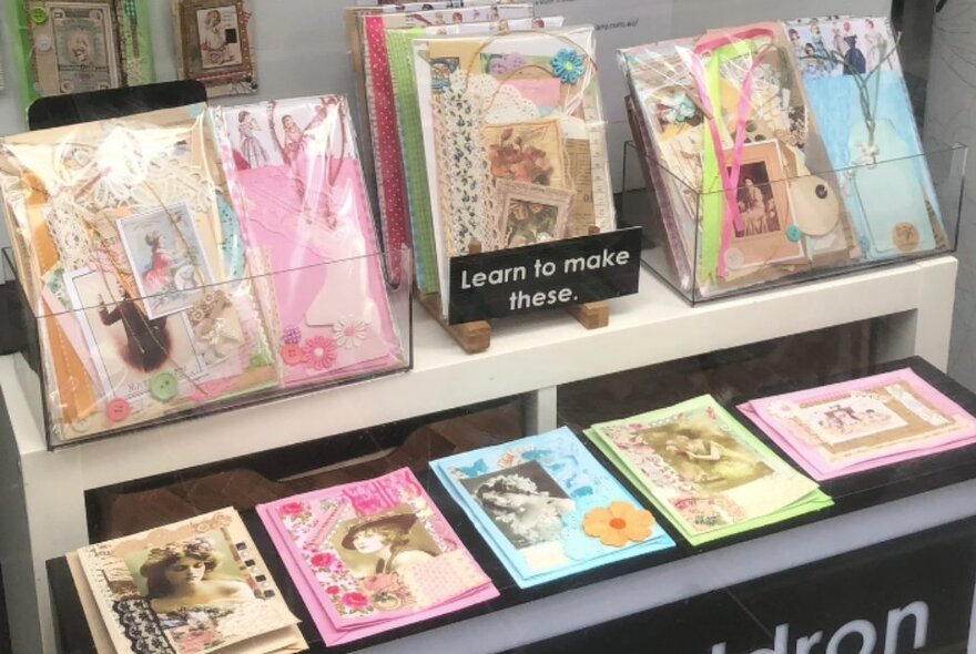 A selection of hand-crafted cards on display.