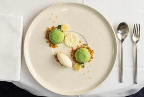 A dessert shaped like tennis balls.