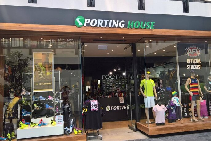 Window display, shopfront and entrance of Sporting House.