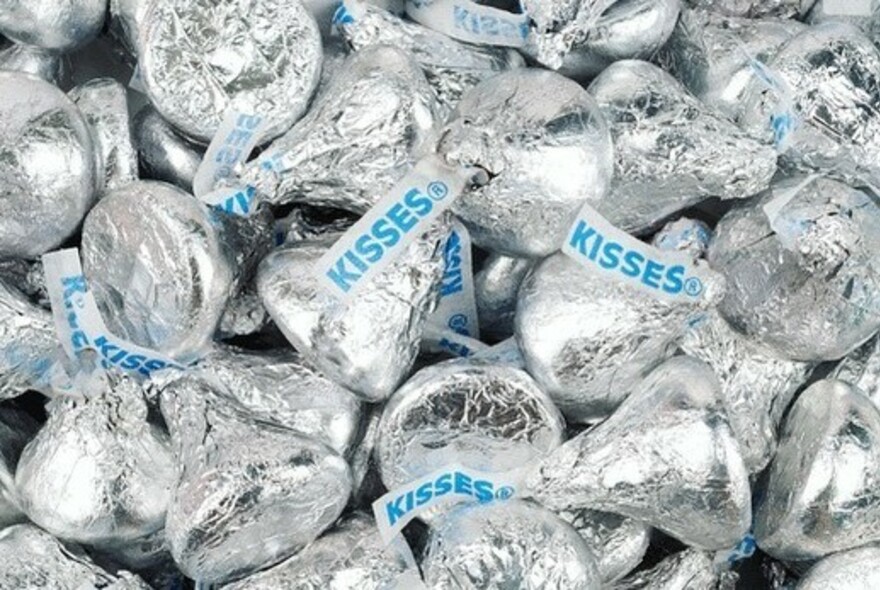 Close up of silver Kisses chocolates.