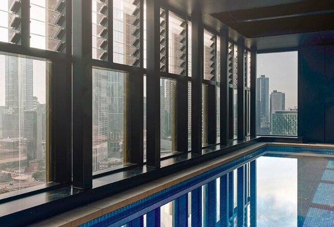 A pool in a city hotel.