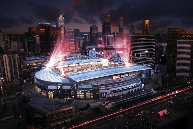 Aerial view of Marvel Stadium lit up at night.