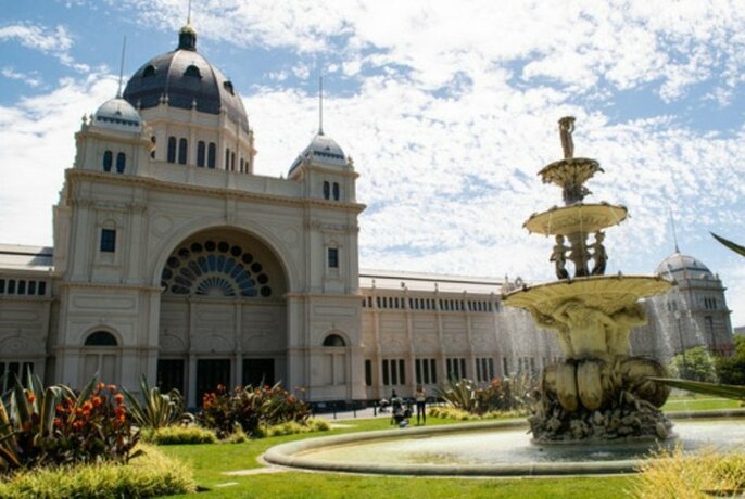 Exhibition Building exterior with domes and fountain.