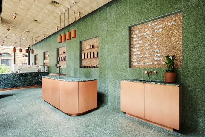 Coffee shop with minimalist design and earthy tones.