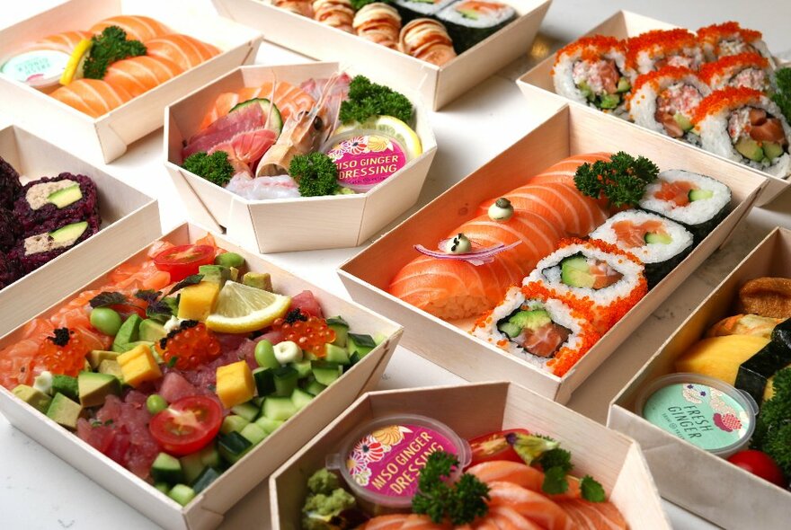 A line-up of assorted sushi and bento boxes.