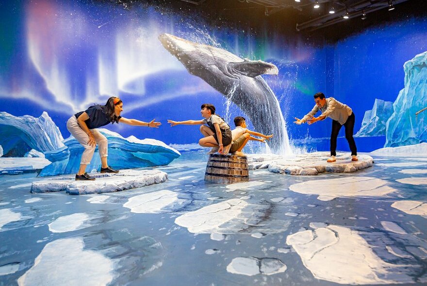 A family posing in a 3D art gallery in a painting of a whale jumping. 