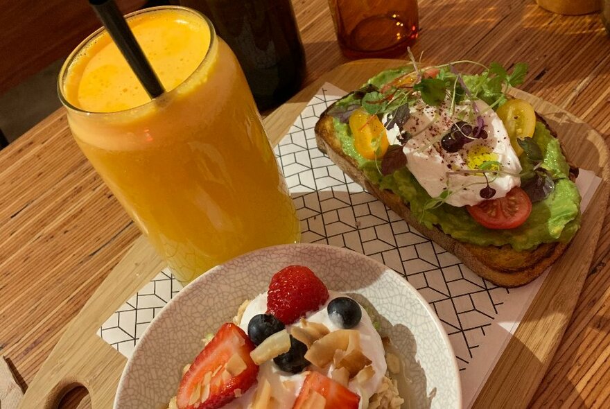 Muesli, salad and an orange juice.