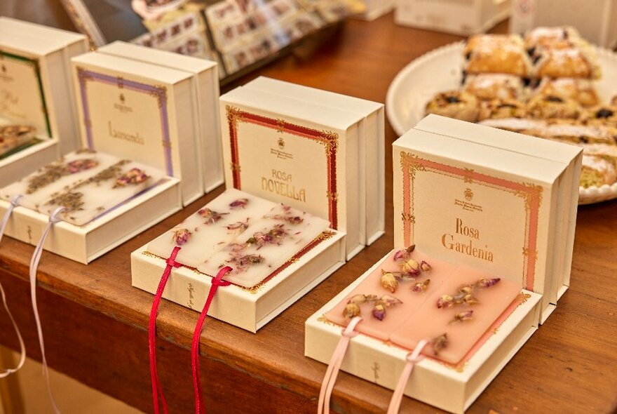 Gift boxes with earrings and ribbons all in a row. 