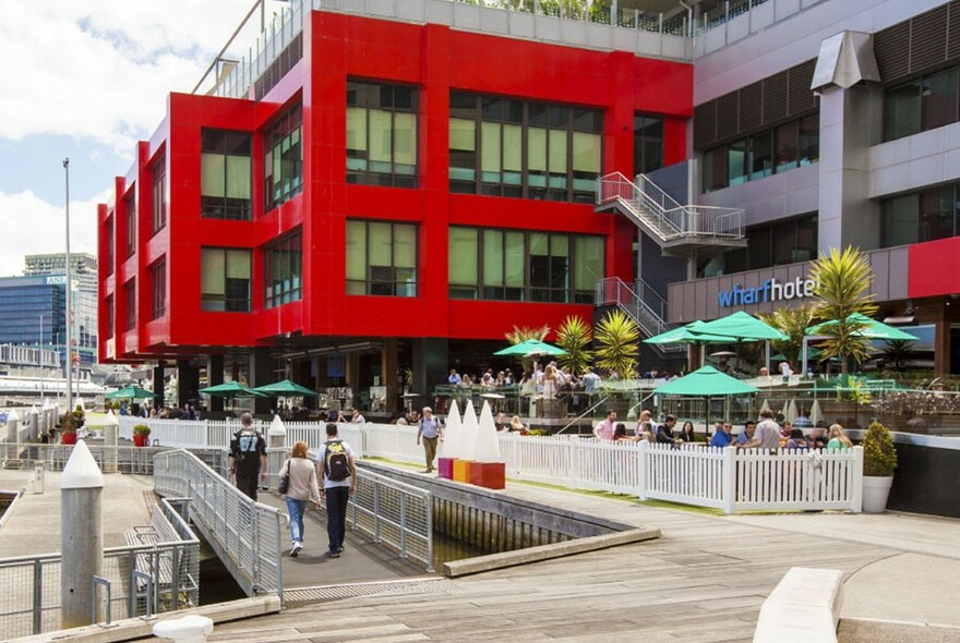 Outdoor seating and exterior of the Wharf Hotel.