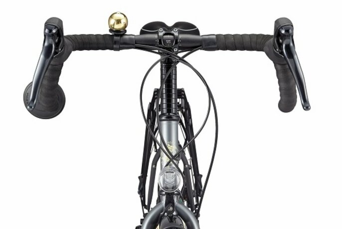 View of a bicycle from behind the handlebars.