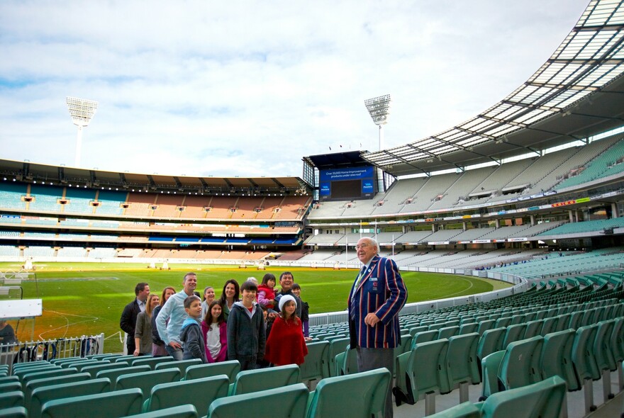 Small group on a tour of the MCG.