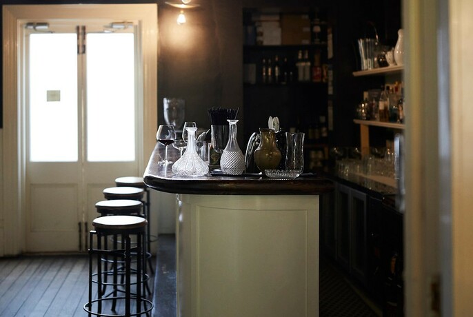 Small bar with glass decanters.