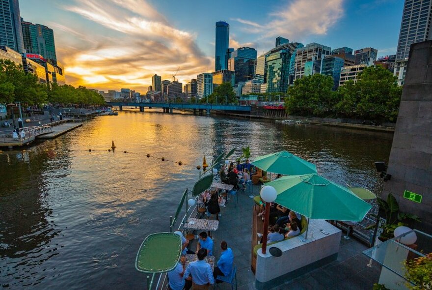 Sunset view looking down on Ponyfish Island Bar with the sky reflected on the Yarra River.