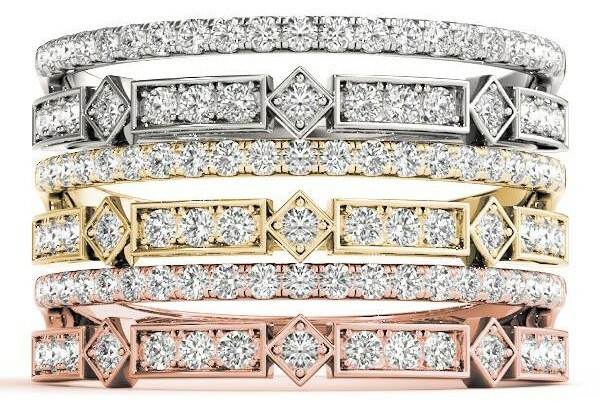 Stacked diamond rings in platinum, gold and rose gold.