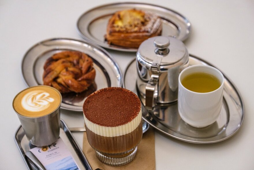 A selection of drinks and pastries. 