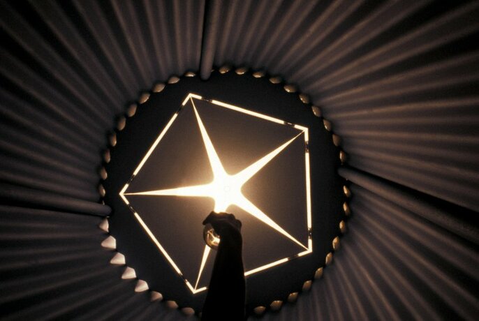 An illuminated star pattern.