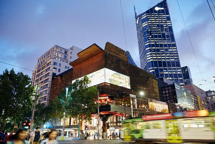 Melbourne Central building on busy Swanston Street.
