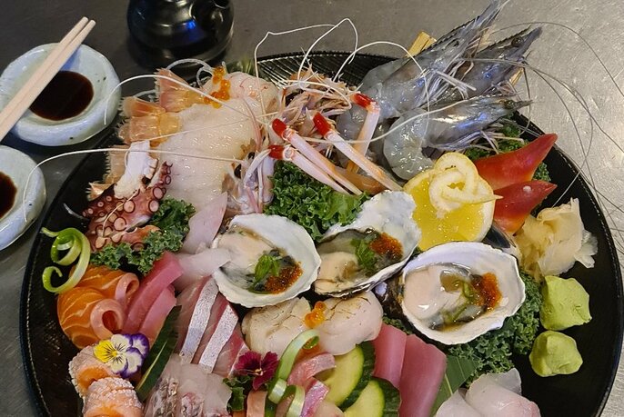 Platter of sashimi and sushi.