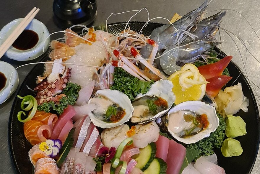 Platter of sashimi and sushi.