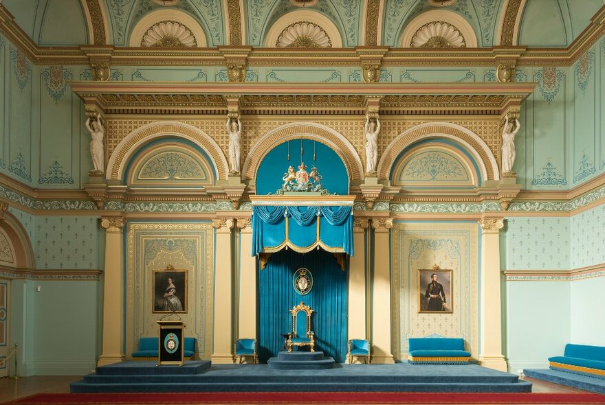 Inside an ornate ballroom 