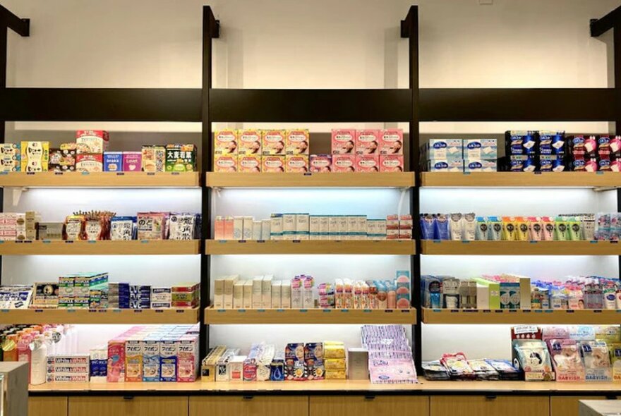 Interior of a retail shop with shelves of skincare products on display.
