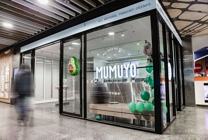 Glass-fronted Mumuyo yoghurt drink booth.