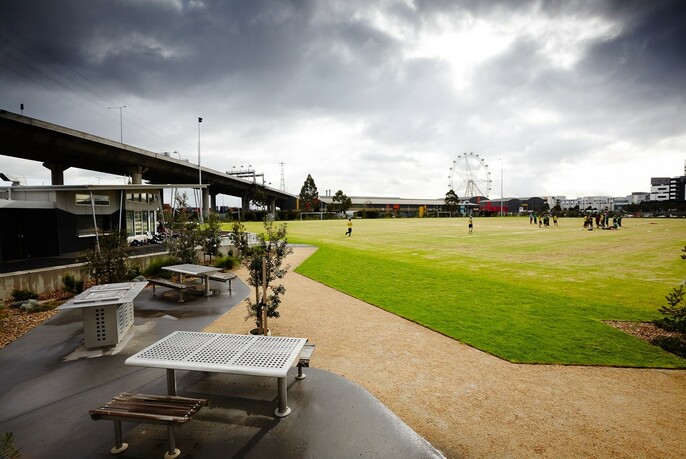 Barbeque facilities and sports field at Ron Barassi Senior Park.
