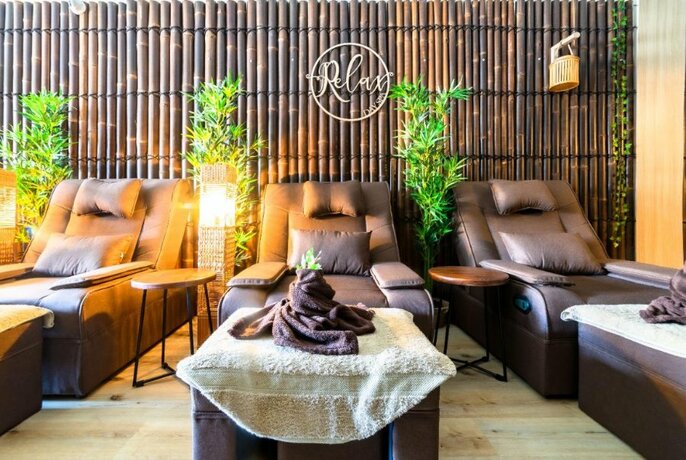 Massage chairs with bamboo tree decorations