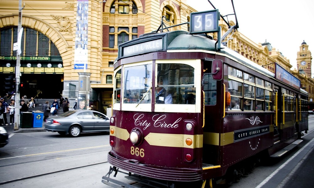 City Circle tram passing in front of Flinders Street Station. 