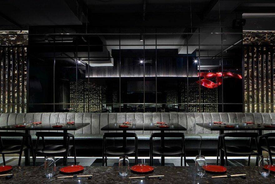 Stylish restaurant with black, white and red decor.