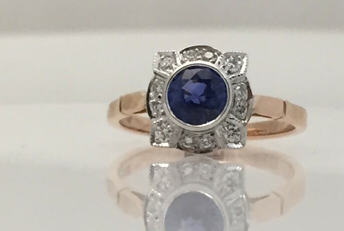Sapphire ring with golden band.