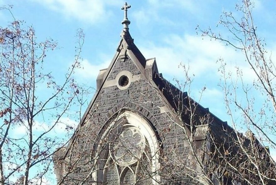 Top of the German Lutheran Trinity Church bluestone church showing the pitched slate roof.