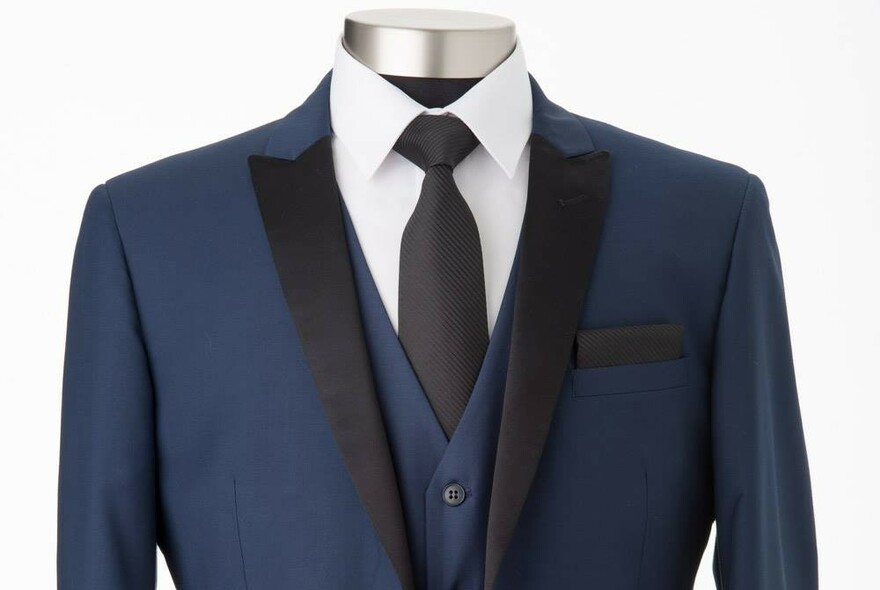 Formal blue suit from chest up, on mannequin.