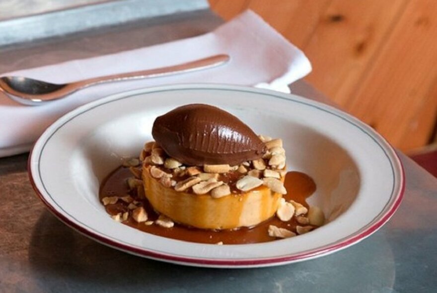A chocolate and peanut butter dessert on a plate