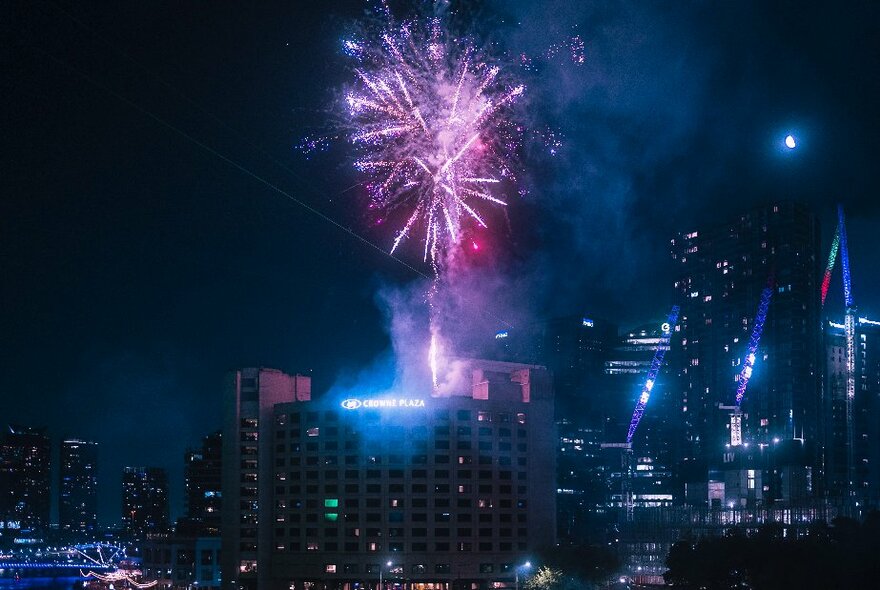 Melbourne city skyline lit up with fireworks.