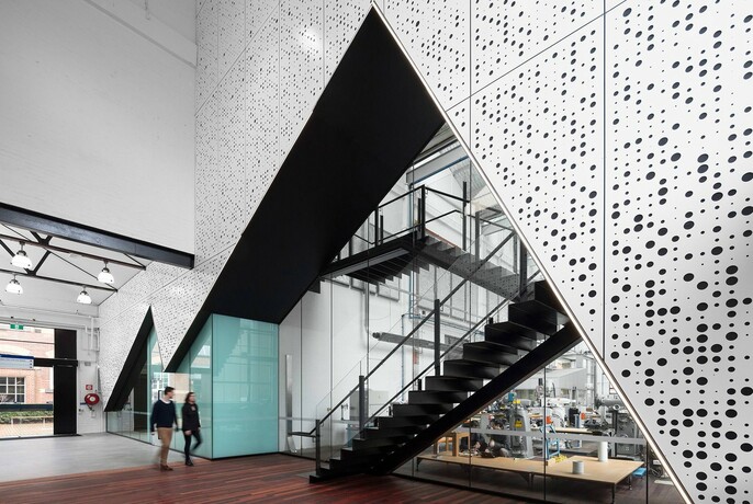 Stairs and modern interior of Melbourne Institute of Technology.