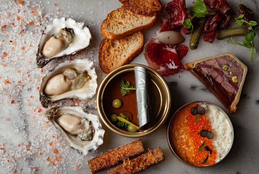Oysters, terrine, toast and dips.