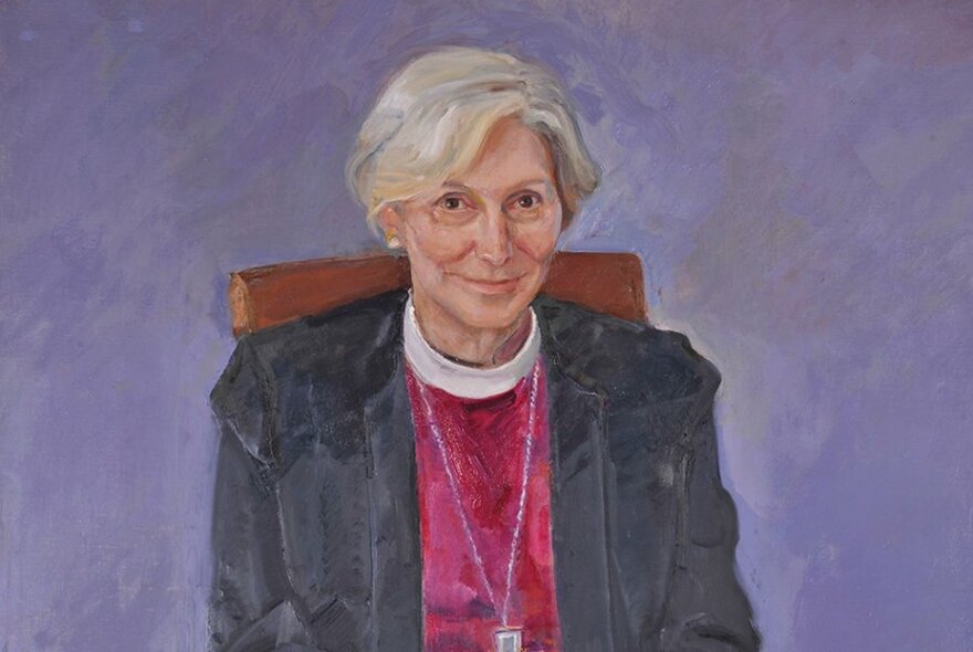Oil painting of a woman, dark cloak, white religious collar, looking intelligently at the viewer, short fair hair, seated and posed against a lilac background.