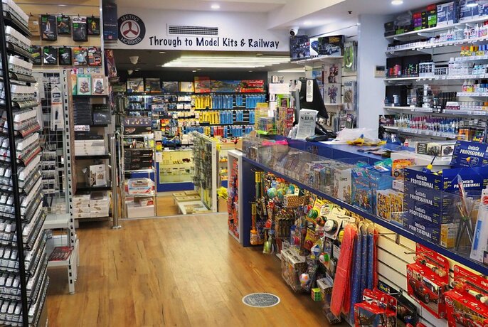 Internal view of Metro Hobbies with shelves and display units filled with products.