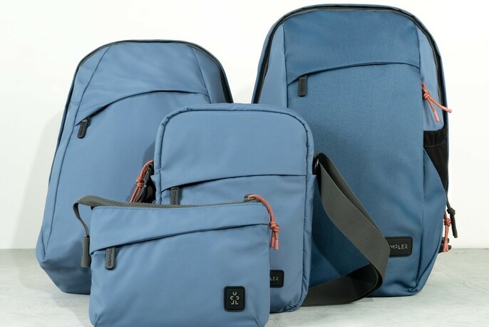 Range of blue backpacks and daypacks.