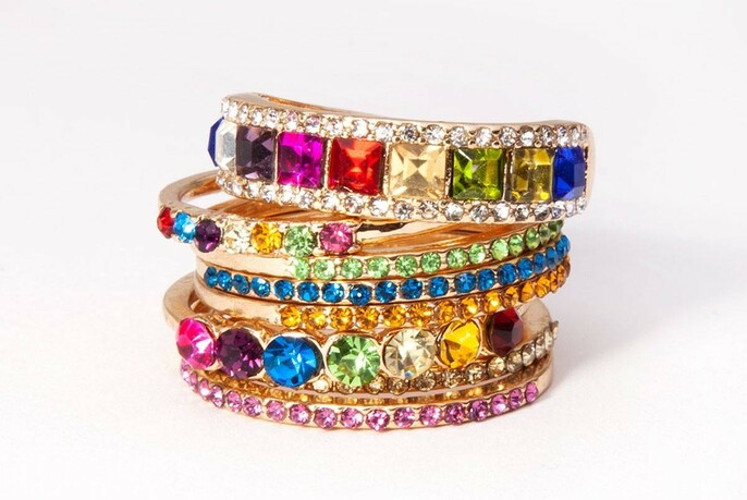 Stack of rings with bright stones embedded.