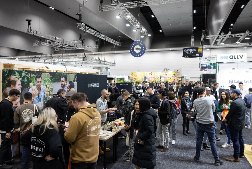 People milling around stalls at the Melbourne International Coffee Expo at the Melbourne Convention and Exhibition Centre.