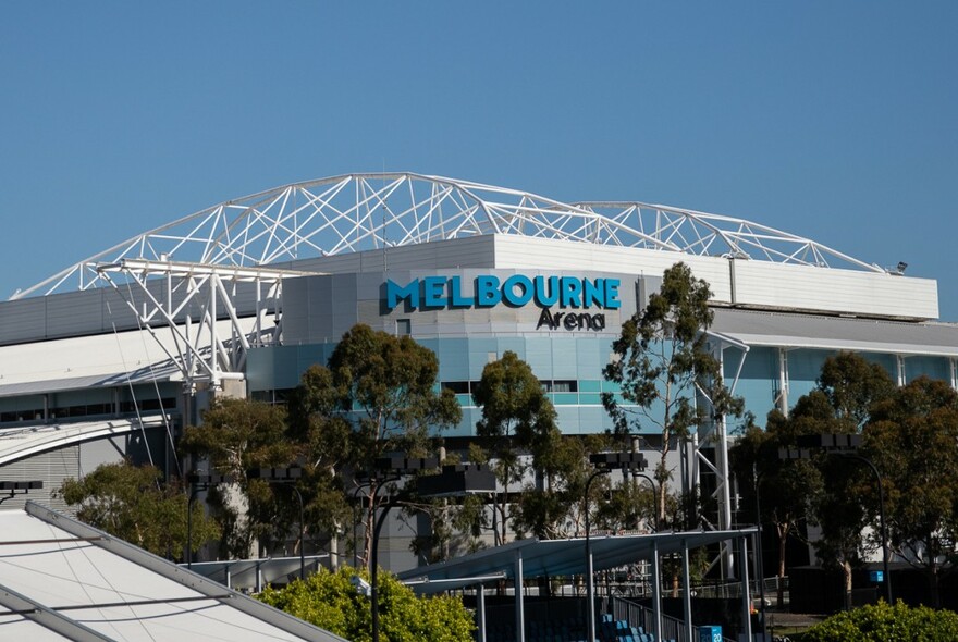 Melbourne Arena building with scaffolding-type roof architecture.