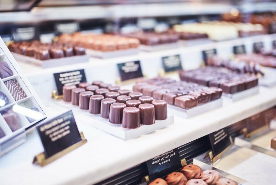 Close up of market chocolate counter.
