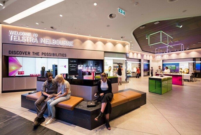 People seated inside Telstra Discovery Centre.