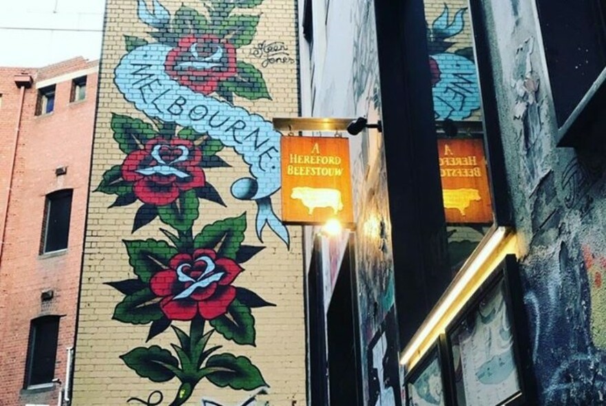 Restaurant exterior with Melbourne rose tattoo graffiti.