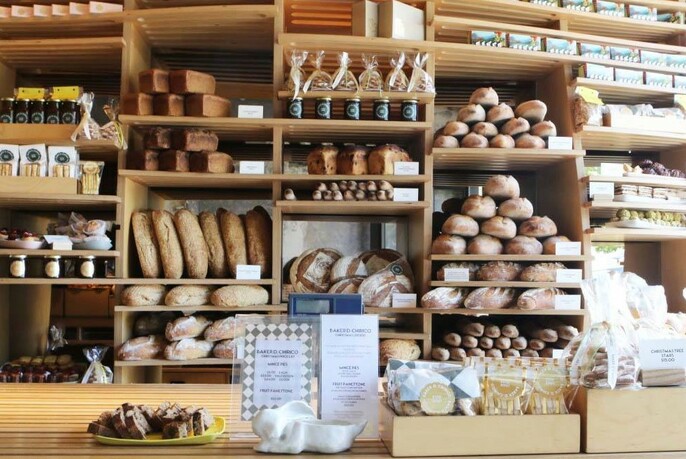 Artisan breads on display inside Baker D Chirico bakery.