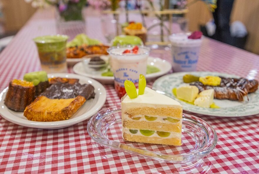 A table of cakes and pastries